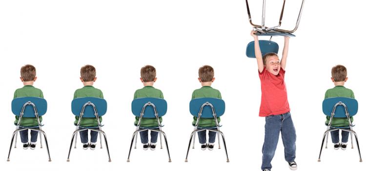 five children sit on chairs one child stands with chair held over head